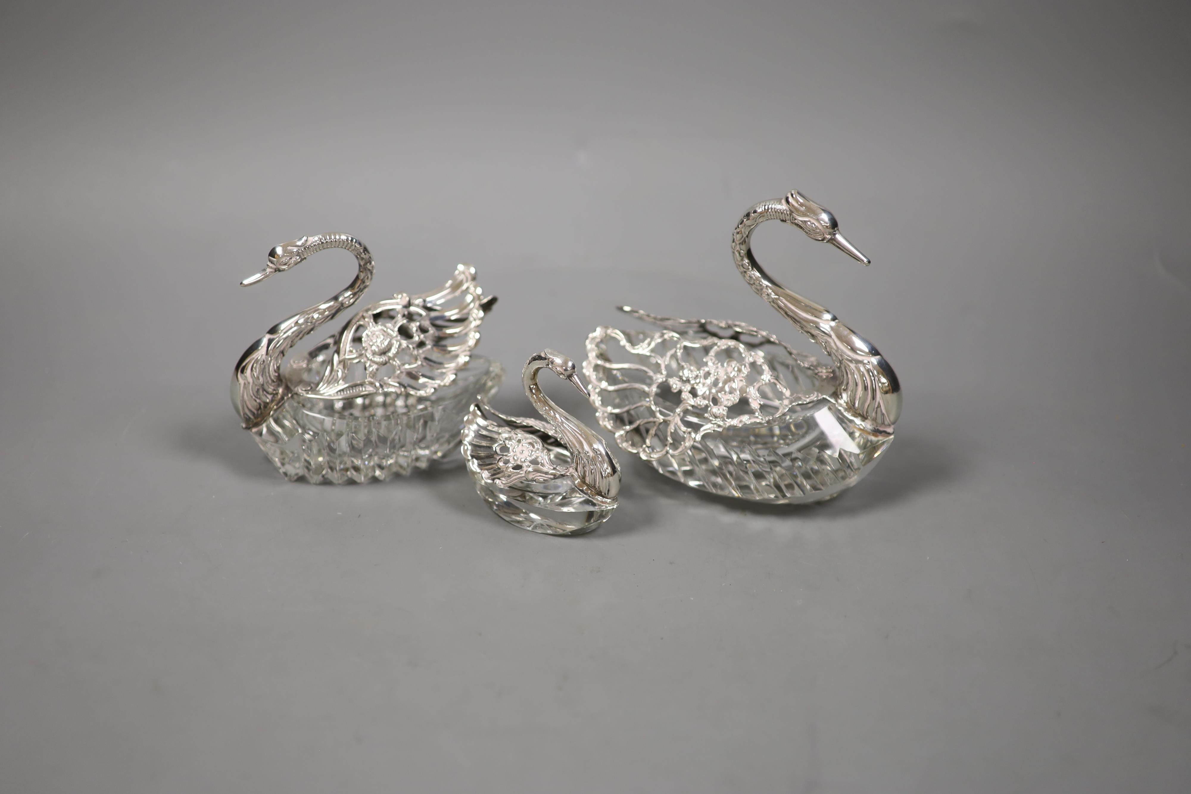 A set of three graduated silver-mounted cut glass 'swan' bon bon dishes